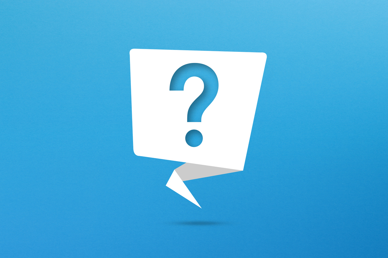 Question mark with speech bubble on blue background